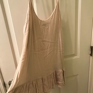 Nude slip dress with ruffle skirt